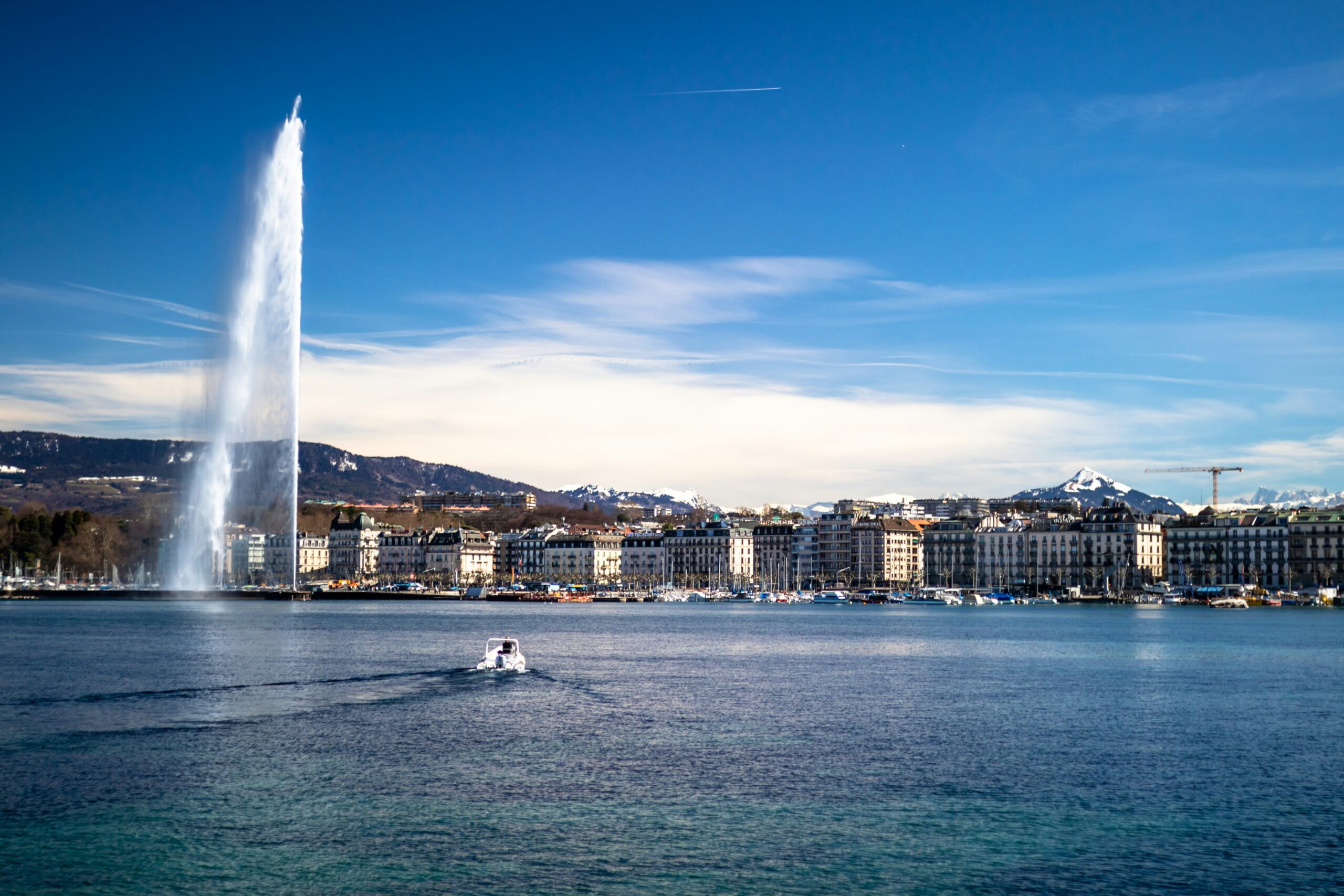 Geneva AI Summit 2027 venue city: Jet d'Eau fountain and Lake Geneva skyline